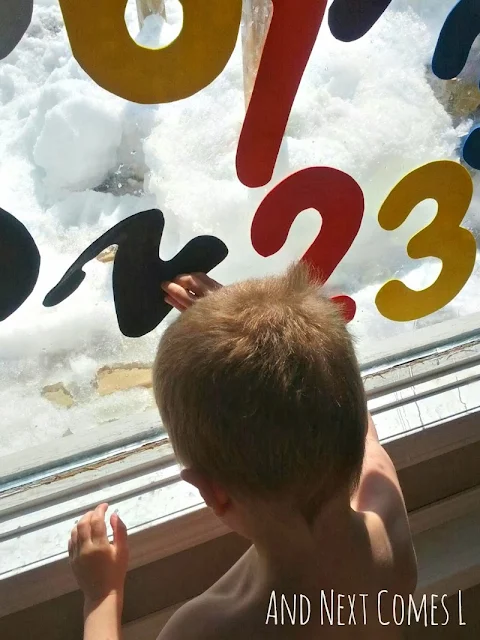 Large homemade foam numbers stick to windows when wet