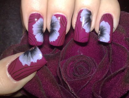 Purple Nail Art with White Flowers