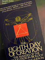 The Eighth Day of Creation: The Makers of the Revolution in Biology, by Horace Freeland Judson, superimposed on Intermediate Physics for Medicine and Biology.