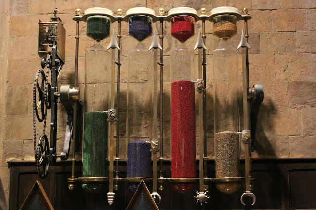 A picture of the Hogwarts house points hourglasses