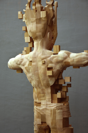 A Pixelated Wooden Snorkeler Sculpted by Hsu Tung Han