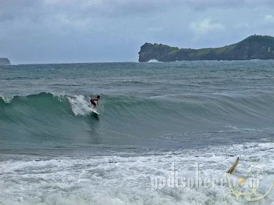Surfing at Pundakit Zambales Surfer riding waves