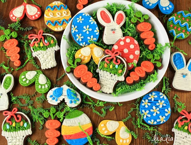 Decorated buttercream Easter sugar cookies - basket, egg, bunny, bunny prints and carrot cookies