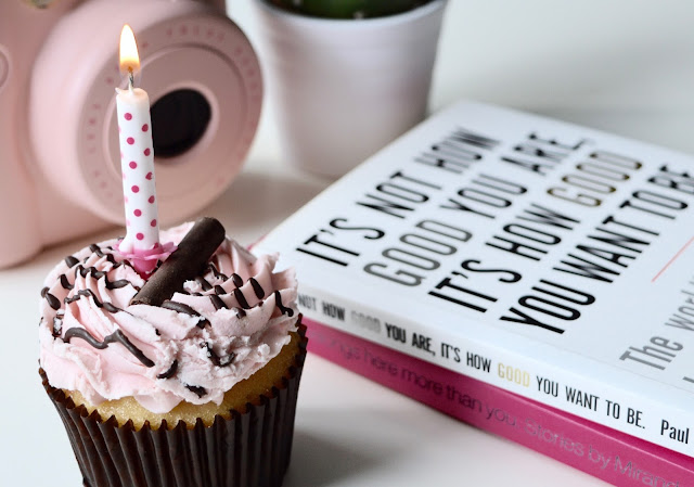 pink birthday cupcake and candle