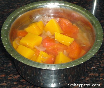 pressure cook the pumpkina nd ingrdients -preparing pumpkin soup recipe