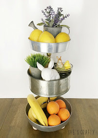 Use a 3 tiered tray to store fruit and seasonal decorations