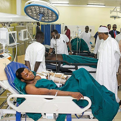 Photos: Pres. Buhari visits Abuja bomb blast victims, pays bill of girl shot by armed robbers