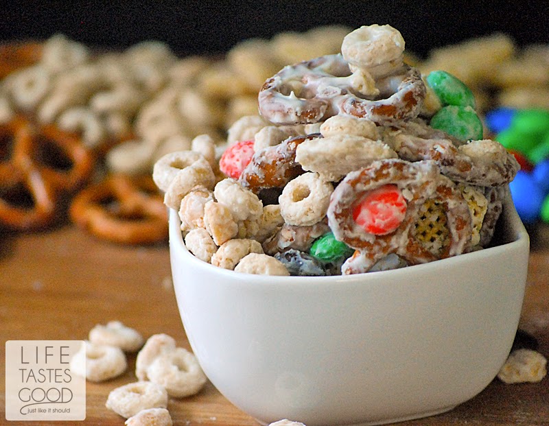 Easy Sweet and Salty Snack Mix | by Life Tastes Good is made with M&M's®, cereal, pretzels, and peanuts all covered in creamilicious white chocolate! #HeroesEatMMs #CollectiveBias #Shop
