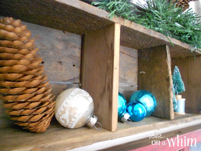 Pinecones and Ornaments in Vintage Wooden Cubbies via Denise on a Whim
