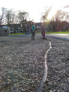 excavating storm drain pipe in public amenity play area