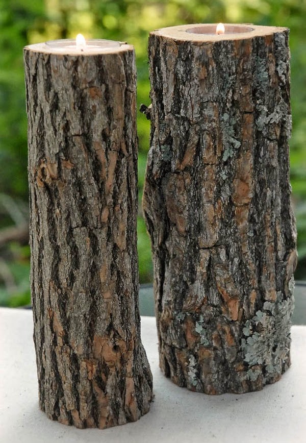 Bougeoirs avec des branches d’arbres