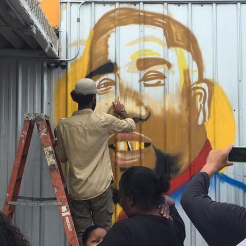 2 Image of Alton Sterling painted on the wall outside the store cops fatally shot him (photos)