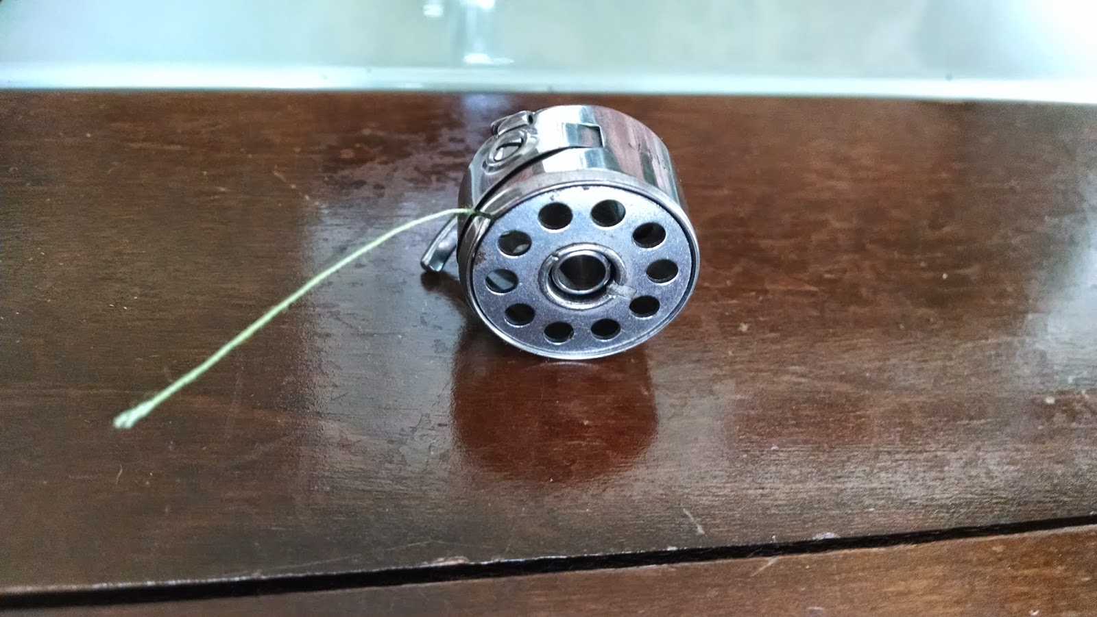Planet DIY: Threading in the bobbin of a Kenmore Model 33 Sewing Machine