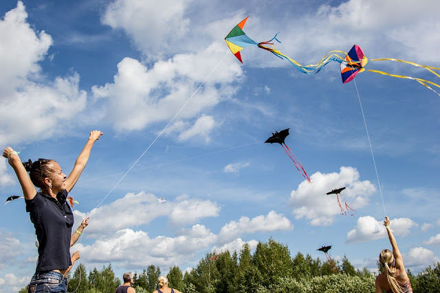 Enjoying a summer day of flying kites