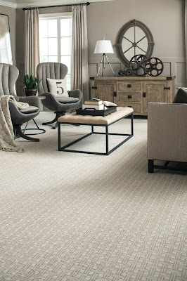 Cool gray carpet with a subtle pattern creates a soothing retreat.