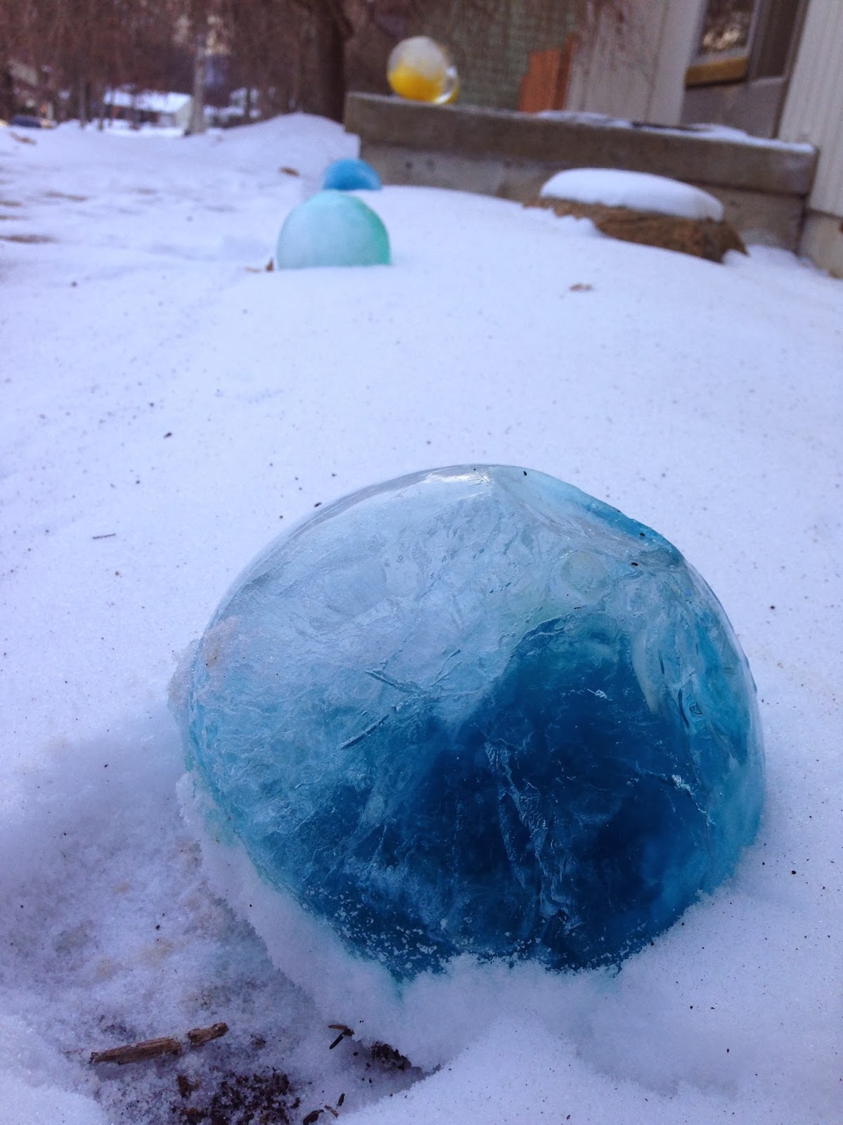 Live with Flair Giant Frozen Colored Ice Balls on My Lawn