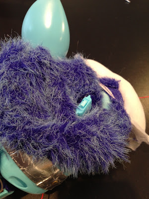 Inside the furby, removing ears