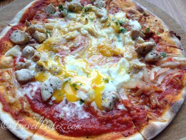 Provincale Pizza - Tomato Sauce, Mozearellt, Onion, Chicken Chunks with a Soft Egg Set in the Cente