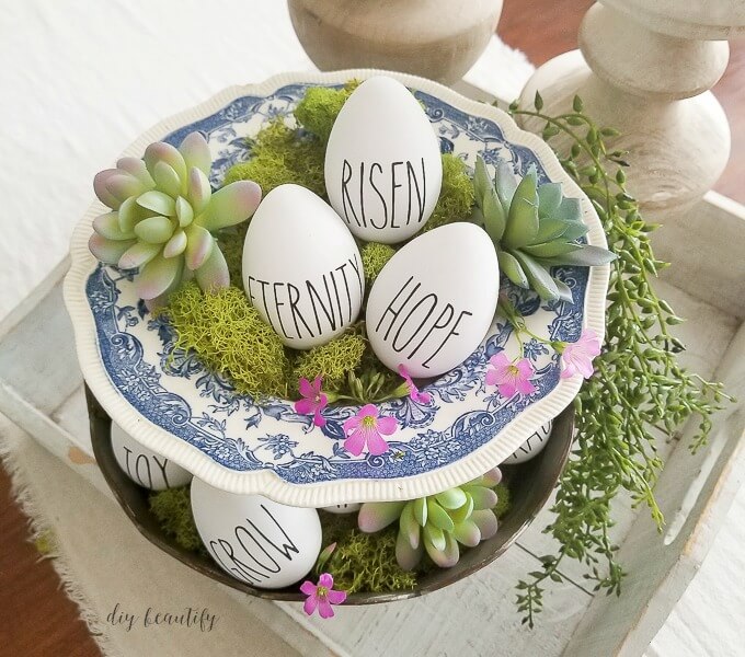 Rae Dunn inspired Easter eggs with moss and succulents