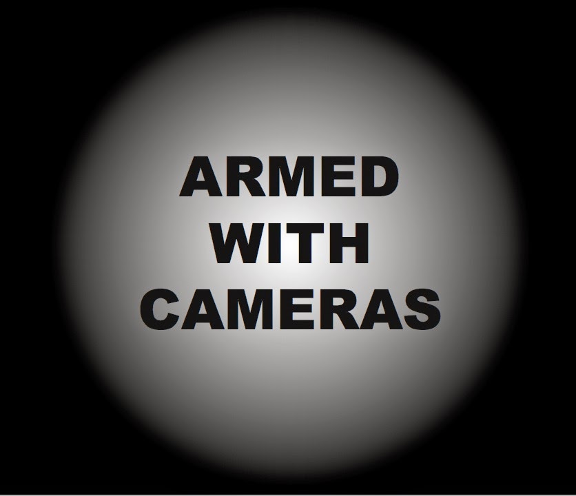 CONTRARY BRIN Armed with Cameras...