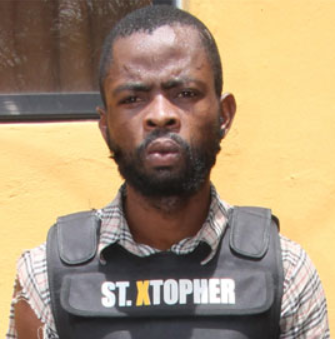 robber suspected armed police arrests vest bullet aba proof