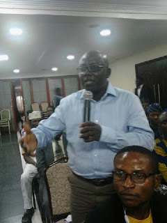 A member of audience sharing his views A member of audience sharing his views