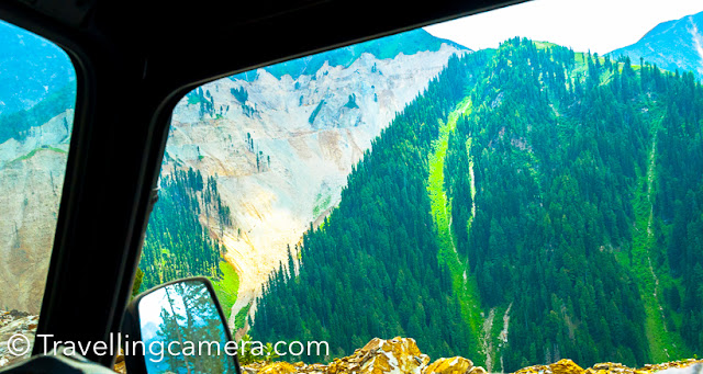 I love exploring hills and road journeys make these explorations special. Road Journey from Delhi to Srinagar through Mughal Road has been one of the best Road Journeys so far. After 3 years, today I came across some these photographs from the ride and thought of sharing this post with Travel & Photography enthusiasts.Mughal Road is the road between Bafliaz to Shopian district in the Kashmir valley. Bafliaz is a town in the Poonch district of Jummu & Kashmir state of India. Mughal road is approximately 85 kilometers which passes through beautiful Pir Panjal Mountain range Mughal road brings Poonch and Rajouri districts closer to Srinagar in Kashmir valley. The distance between Srinagar and Poonch has been reduced from 588km to 126km through Mughal Road. This route used to be old Mughal road which is constructed again through beautiful terrains of Kashmir.  Mughal road was historically used by Moghul emperors to travel and conquer Kashmir in 16th century. Mughal road was used by Akbar to conquer Kashmir in 1586 and his son Emperor Jahangir died while returning from Kashmir on this road near Rajouri.Mughal Road also makes for alternate road route to Kashmir valley from rest of India, other than main Jammu Highway through Jawahar Tunnel (Banihal Tunnel).The famous Mughal road passes through Buffliaz, Behramgalla, Chandimarh, Poshana, Chattapani, Peer Ki Gali , Aliabad, Zaznar, Dubjan, Heerpora and Shopian. Hirapor Wildlife Sactuary also comes on the way. In fact Mughal road crosses through Mughal road in Kashmir.Mughal road crosses through beautiful landscapes full of high deodars, huge mountains, snow covered peaks, green meadows, water streams of different sizes, army points and lot more. On our way, we took few breaks for tea, snacks & lunch. There are very few options for lunch but you can enjoy tea at different places on Mughal Road.