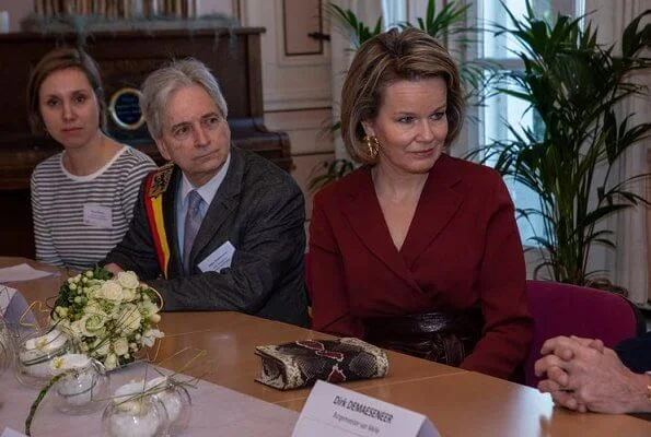 Queen Mathilde of Belgium visited a Horticultural School (Tuinbouwschool) in Melle. brown leather skirt silk blouse