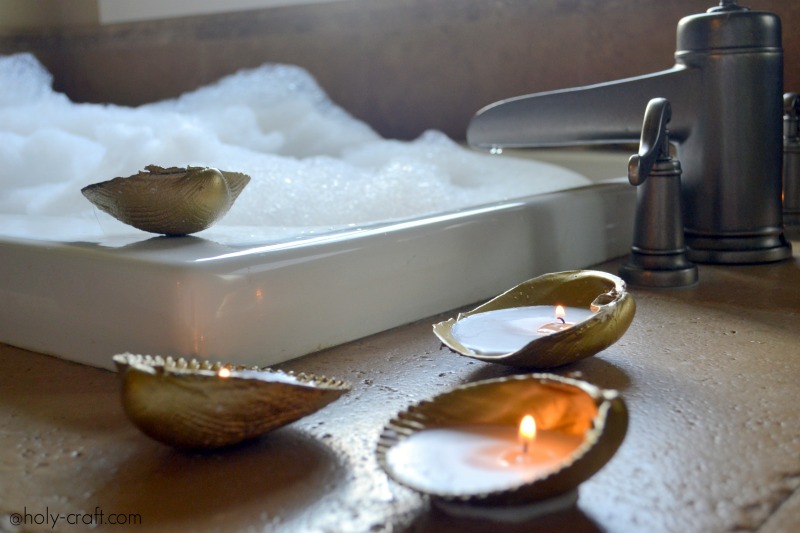 Gold painted seashell candles