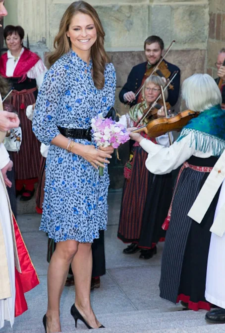 Princess Madeleine of Sweden attends Jarvsomassan a folk fair for musicians Hedvig Eleonora Church in Östermalm. Princess Madeleine wore Alice Temperley Leopard Print Dress