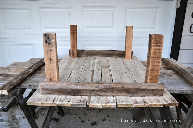 Learn how to build a rustic pallet wood coffee table from scratch! And decorate it well with plenty of cool vintage rusty junk!