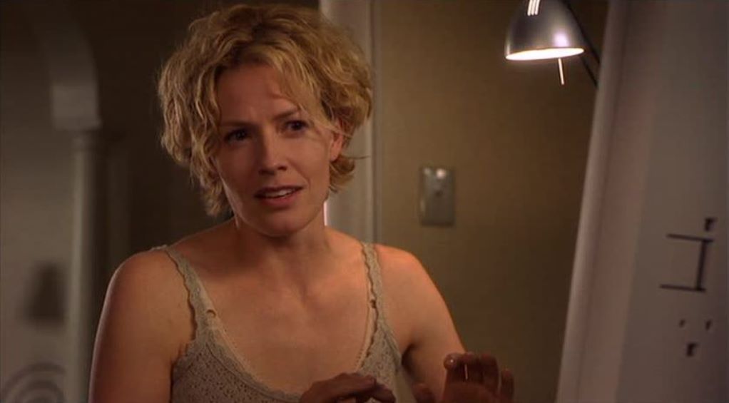 Kim Dickens as Sarah Kennedy. 