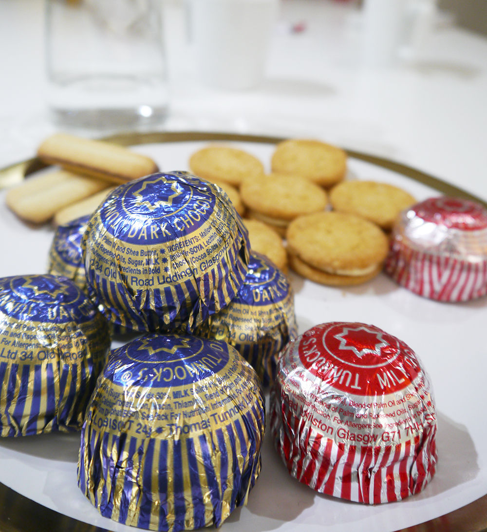 Proper Scottish biscuits with Tunnocks Plate of Tunnocks tea cakes, red and blue tunnocks tea cakes, Fox biscuits, biscuit pyramid