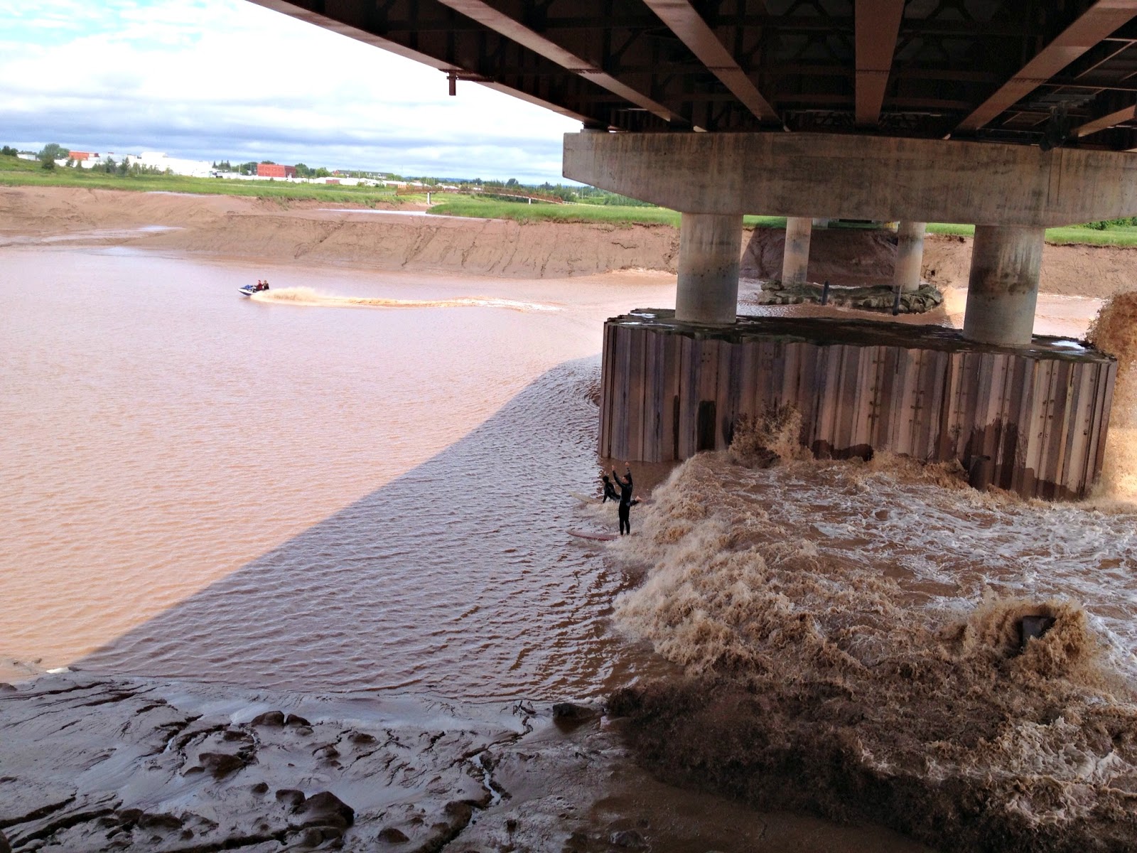 Carol Steel Surfing on the Petitcodiac River NB