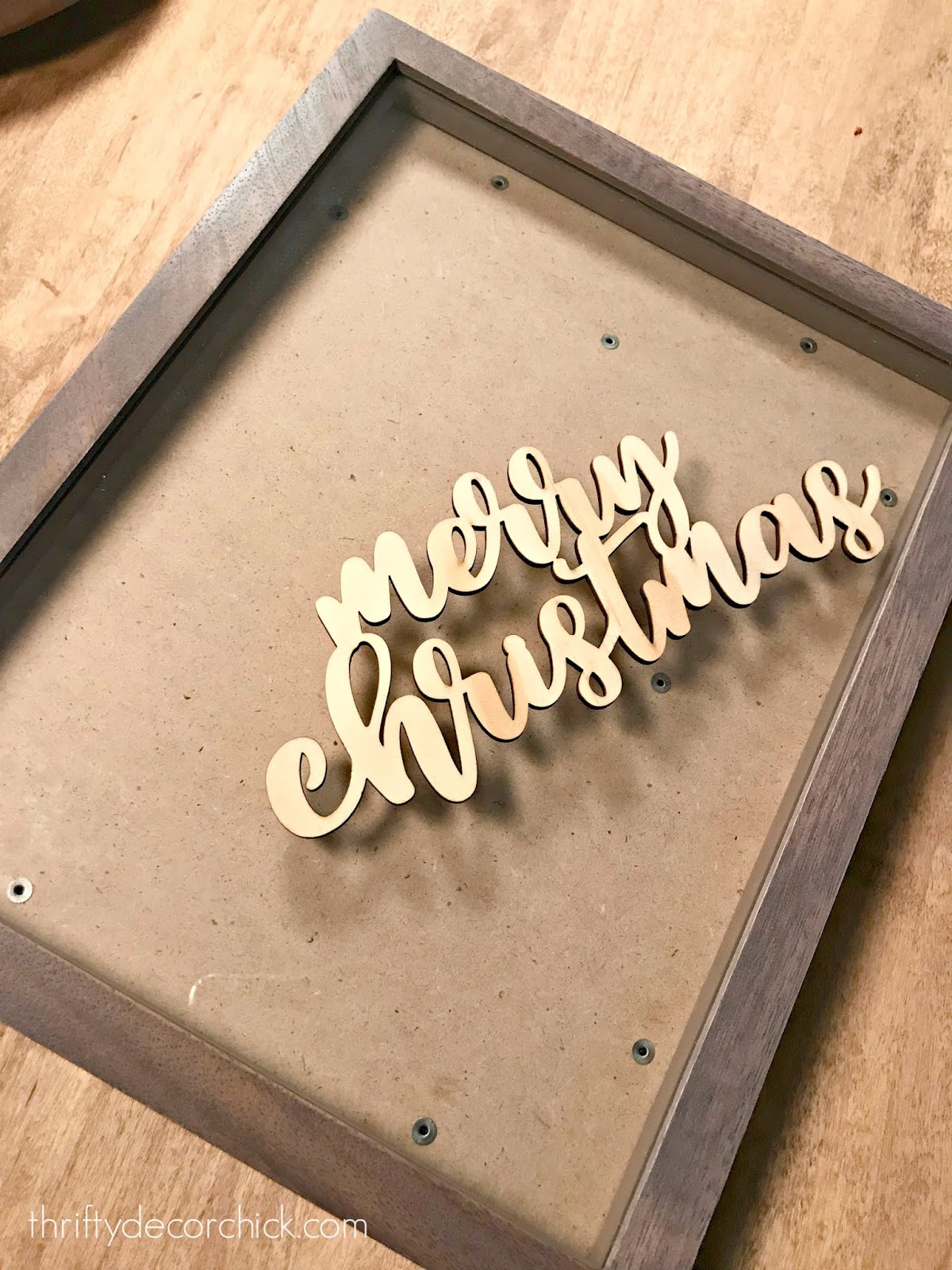 Knock-off DIY Christmas snow globe frame for less!