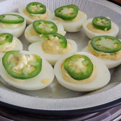 Jalapeno Deviled Eggs:  Hard-boiled eggs, split, and the whites filled with a spicy jalapeno yolk mixture.