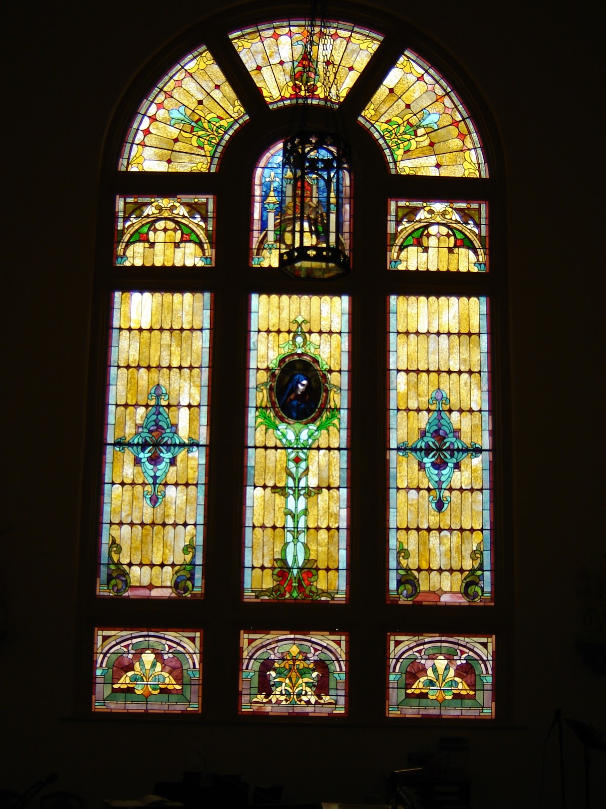 A Catholic Priest in Mississippi Stained glass window St Mary