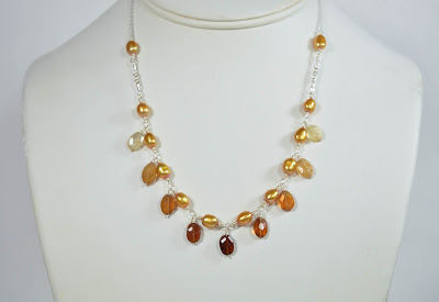 hessonite garnet and gold pearl fall statement necklace