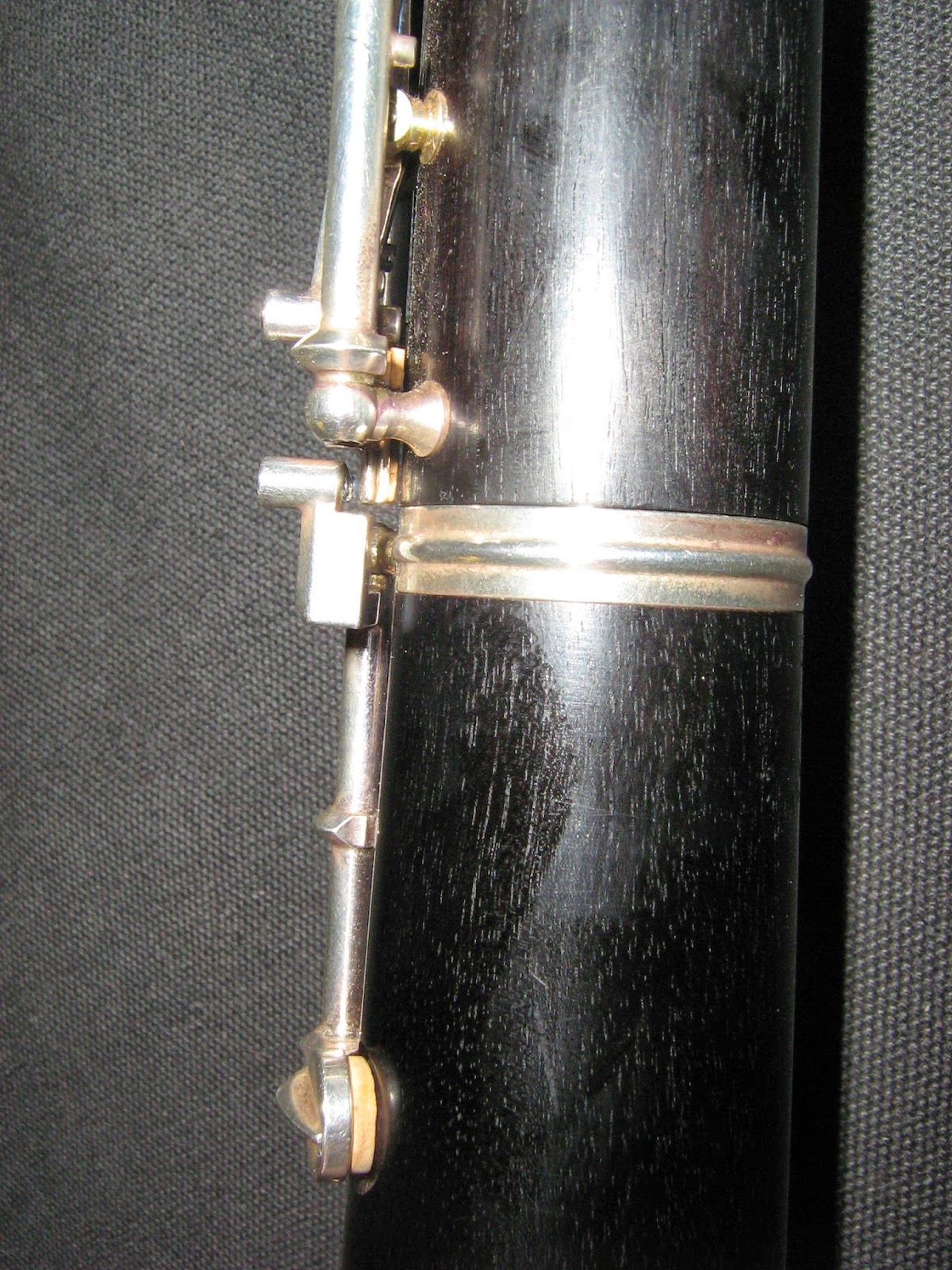 The Bench Keystone Regulating the Lower End of an Oboe