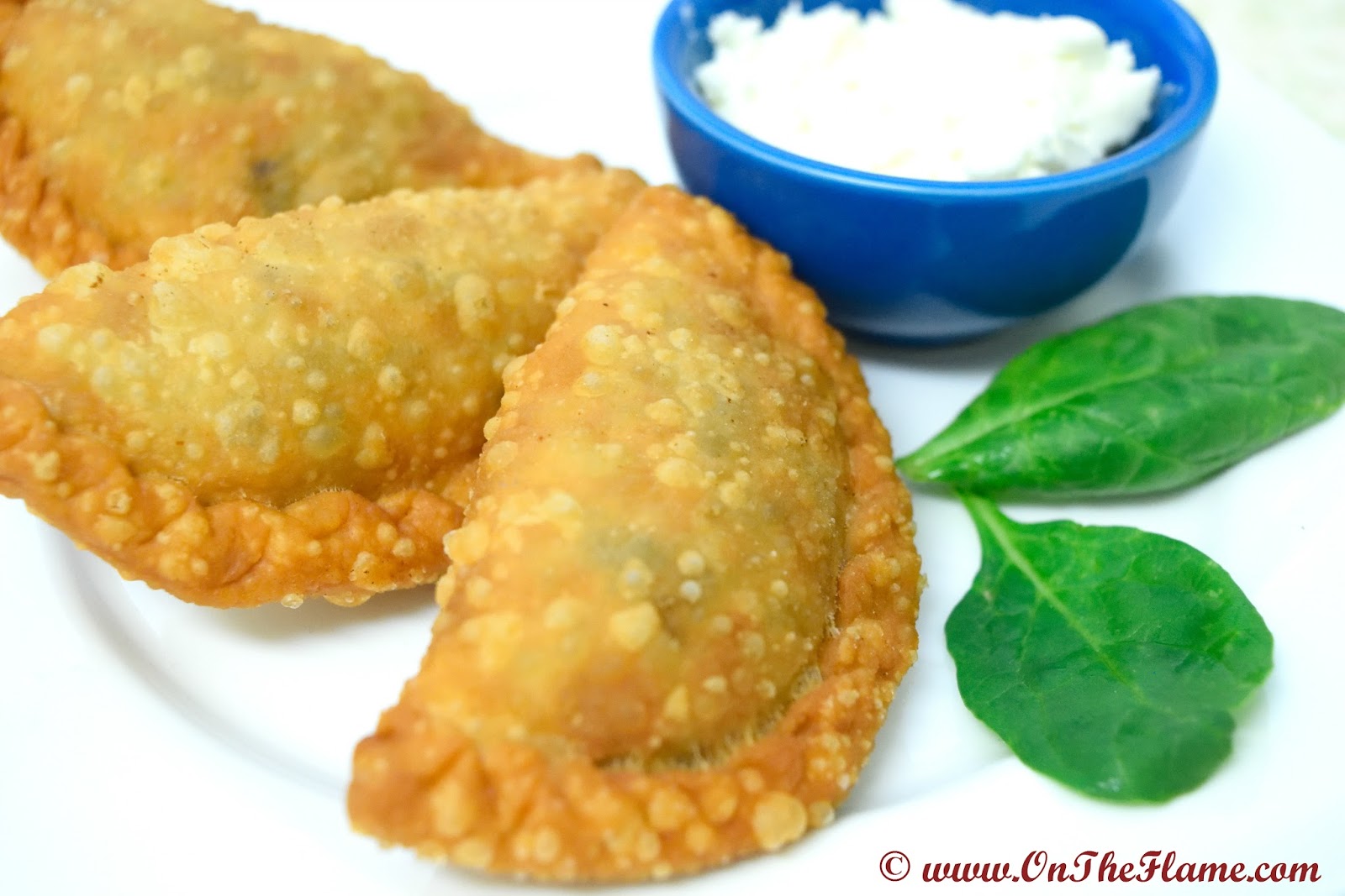 On the Flame by Rekha Nahata Spinach Feta Sambousek