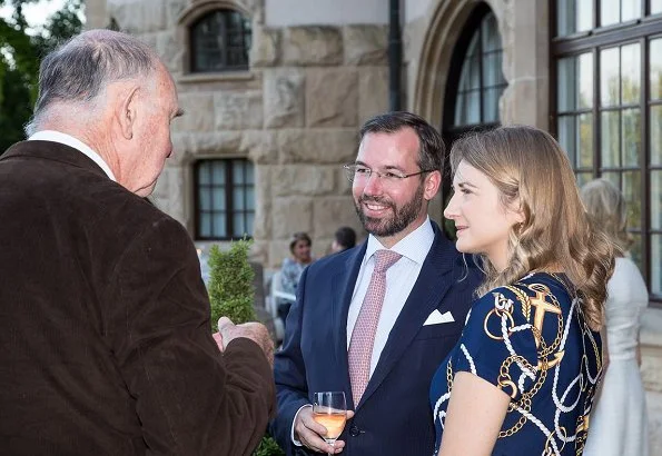 Princess Stephanie wore a blue jersey cotton nautical anchor dress by Ralph Lauren. Maria teresa wore Elie Saab printed silk blouse