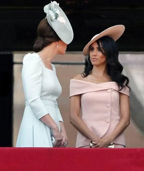 Meghan Markle, The Duchess of Sussex is wearing a dress by Carolina Herrera. The Duchess of Cambridge is wearing a dress by Alexander McQueen. wessex