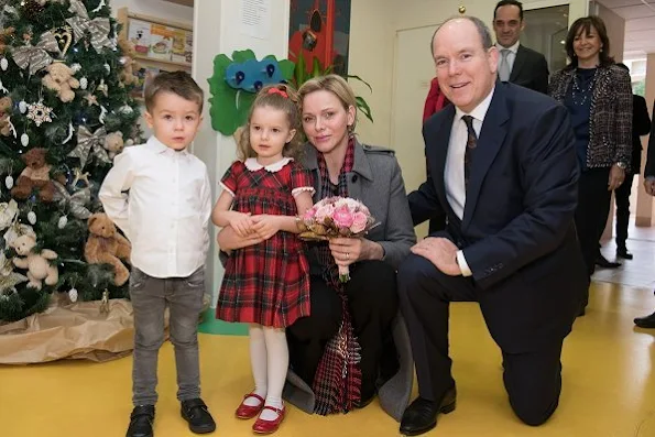 Princess Charlene wore Louis Vuitton wool coat. Rosine Sanmori Nursery / Day Care Centre in Fontvieille. Christmas gifts