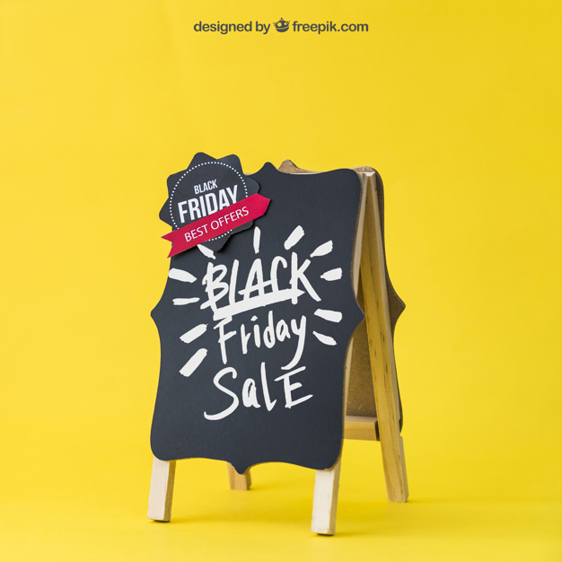 Black friday mockup with decorative board Free Psd