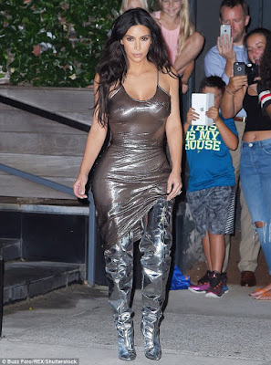 1a2 Kim Kardashian steps out in a braless sheer dress that showed off her nipples