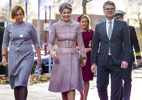 Queen Maxima wore a belted coat dress by Claes Iversen, and hat. Hans Boodt Mannequins in collaboration with Claes Iversen