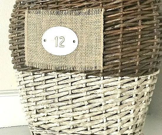 basket with burlap bottom and metal tag