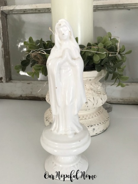 white porcelain Virgin Mary Madonna statue
