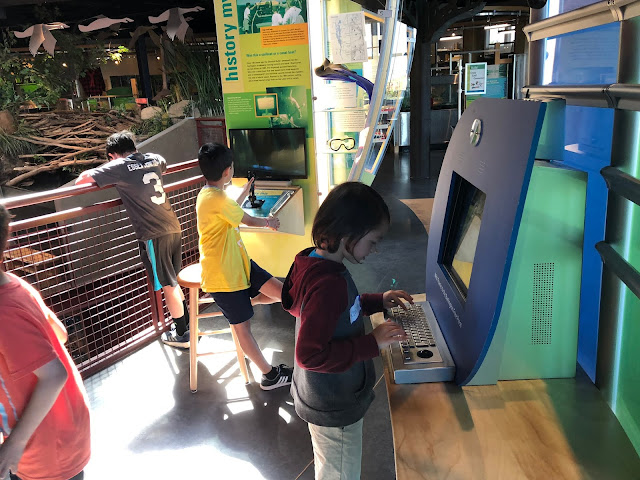 kids checking out technology