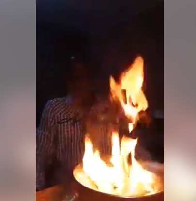 8b Photo: Man burns the crucifix of Jesus, says Christians are hypocrites